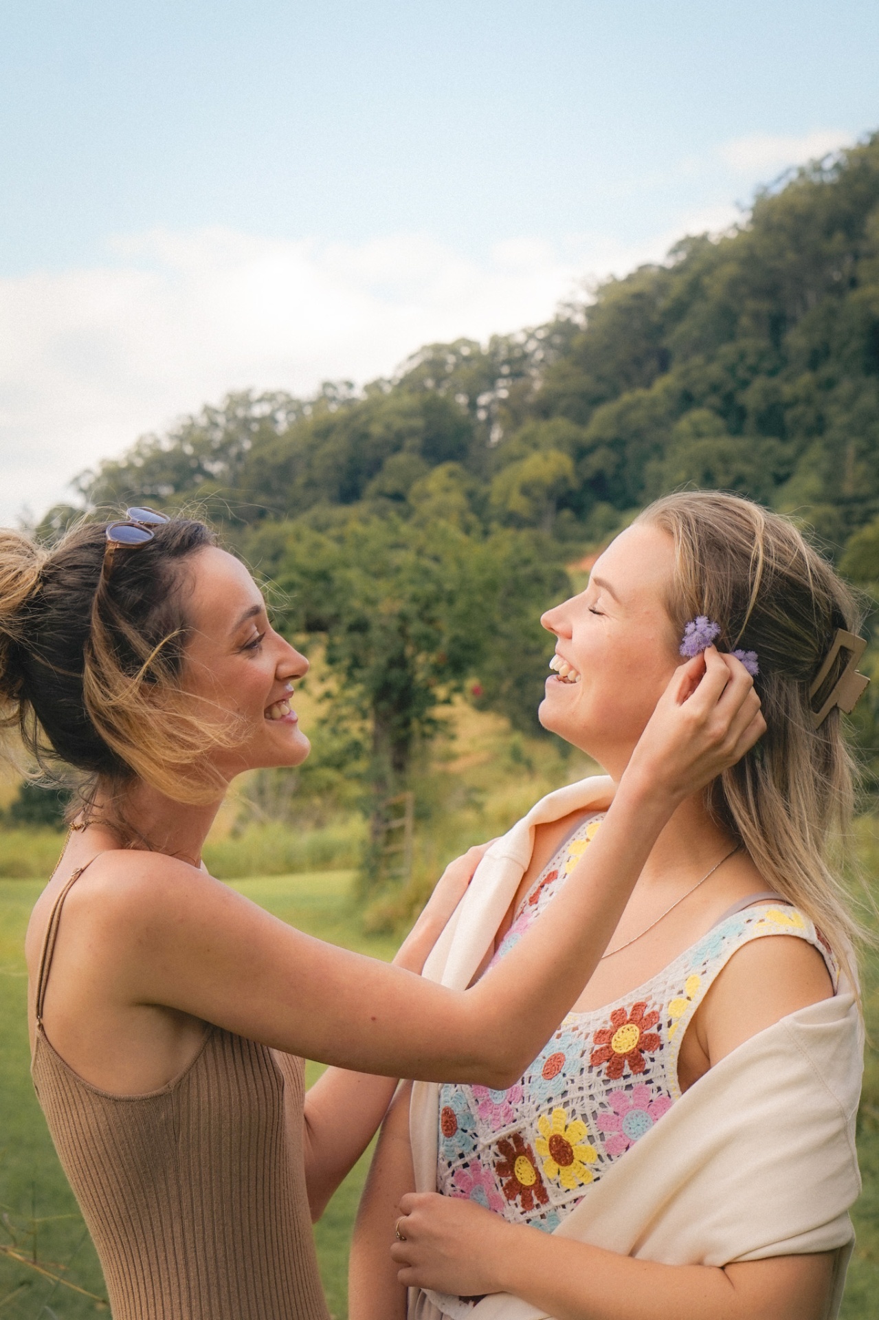 A quiet flower ritual between women at retreat