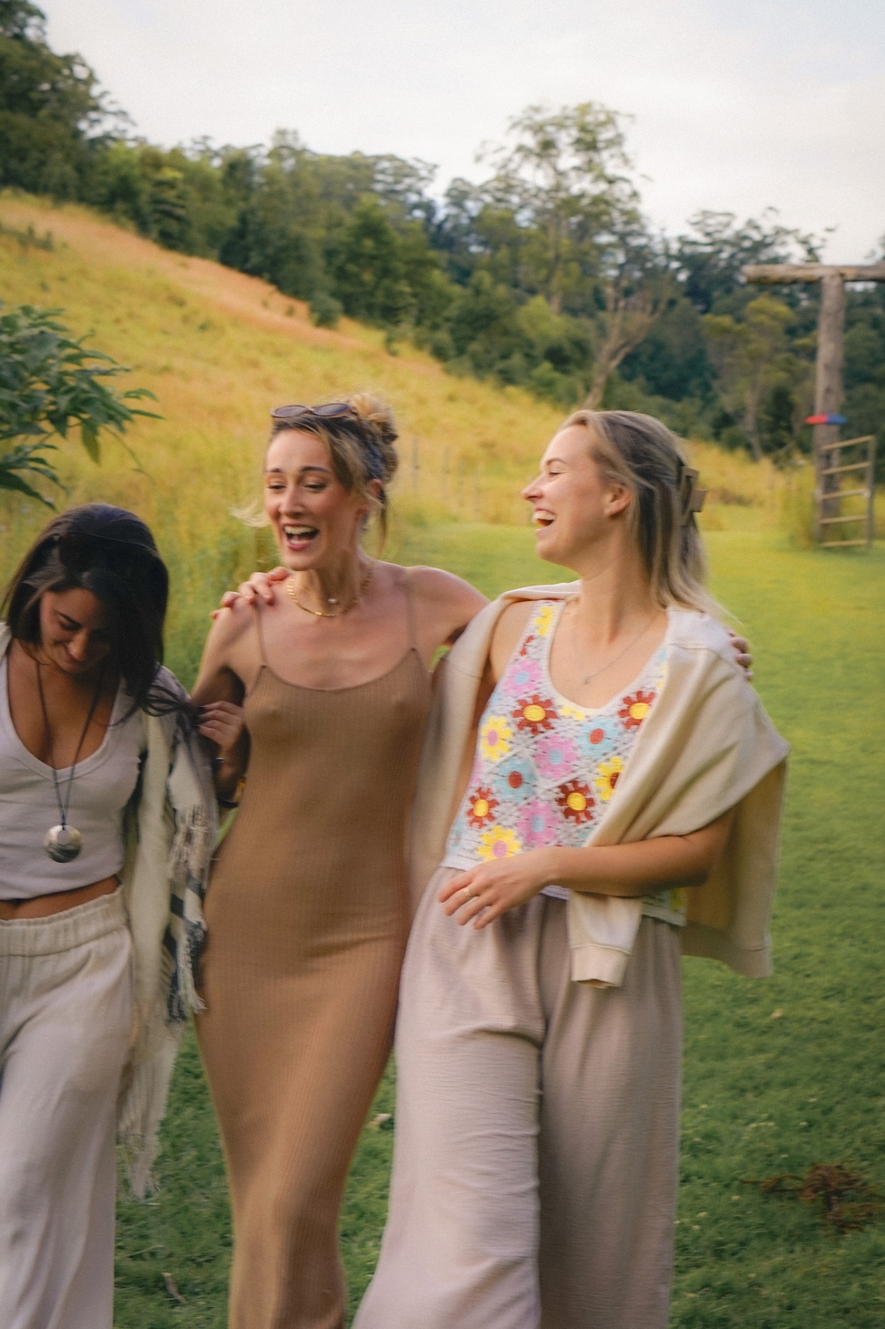 Women laughing together in the hills at an Elementa event